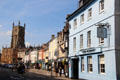 Market Place with view of tower of Church of St John Baptist. Cirencester, England