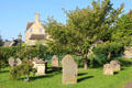 Glimpse of town from cemetery of Church of St Peter & St Paul. Northleach, England.