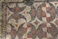 Designs in mosaic floor in cold room at Chedworth Roman Villa. England.