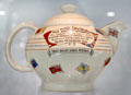 War Against Hitlerism earthenware teapot by AG Richardon & Co Ltd. of Tunstall, Stoke as trade for Aluminum pots turned in for war effort at Potteries Museum & Art Gallery. Hanley, Stoke-on-Trent, England.
