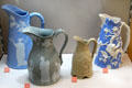 Earthenware jugs decorated with reliefs by T&R Boote of Burslem, Staffordshire shown during Great Exhibition of 1851 at Potteries Museum & Art Gallery. Hanley, Stoke-on-Trent, England.