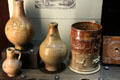 Jugs made in London in styles of bottles imported from Germany at Potteries Museum & Art Gallery. Hanley, Stoke-on-Trent, England.