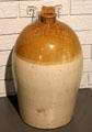 Bristol-glazed stoneware vinegar bottle made for JB Browne & Co. of Newcastle-under-Lyme, Staffordshire at Potteries Museum & Art Gallery. Hanley, Stoke-on-Trent, England.