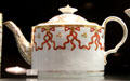 Porcelain teapot with border pattern by John Rose of Coalport, Shropshire at Potteries Museum & Art Gallery. Hanley, Stoke-on-Trent, England.