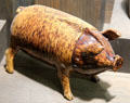 Earthenware pig-shaped jug made for 'hog's head of ale' wedding toast made at Rye, Sussex at Potteries Museum & Art Gallery. Hanley, Stoke-on-Trent, England.