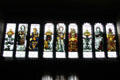 Series of symbol of Ireland, England, Scotland stained glass windows by studio of Charles Eamer Kempe in Great Parlor at Wightwick Manor. Wolverhampton, England.