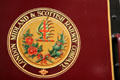 Shield of London Midland & Scottish Railway Co. on steam locomotive no. 74 'Dunluce Castle' at Ulster Transport Museum. Belfast, Northern Ireland.