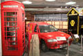 Electric Royal Mail Ford Ecostar van beside red telephone box & AA box at Ulster Transport Museum. Belfast, Northern Ireland.