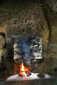 Fireplace in Single Room Cabin at Ulster American Folk Park. Omagh, Northern Ireland.
