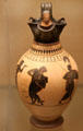 Greek terracotta white-ground oinochoe with Heracles & Nemean lion attrib. to painter of London made in Athens found in Vulci in Etruria at British Museum. London, United Kingdom.