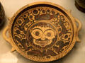 Corinthian pottery bowl painted with gorgon's head ringed by frieze of deer & mythical animals attrib. Medallion Painter from Kamiros, Rhodes at British Museum. London, United Kingdom.