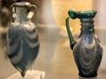 Roman glass jug & amphora with marvered white trails prob. made in Rhineland, Germany at British Museum. London, United Kingdom.