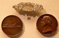 Silver brooch engraved with Crystal Palace ; medal marking move of Crystal Palace to Sydenham in ; & medal of Sir Joseph Paxton designer of Crystal Palace at British Museum. London, United Kingdom.