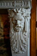 Arts & crafts style carving of a French settler on fireplace in Governor's Reception Room of Arkansas State Capitol. Little Rock, AR.