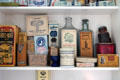 Bathroom cabinet with antique pill & tonic boxes in Corbett House at Tucson Museum of Art. Tucson, AZ.