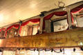 Private boxes with curtains to allow prostitutes to ply trade over circus mural at Bird Cage Theatre. Tombstone, AZ.