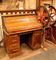 Slatted closing desk & large coffee grinder at Bird Cage Theatre. Tombstone, AZ