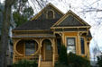 Yellow Eastlake-style house on F St. between 11th & 12th. Sacramento, CA