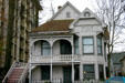 White Eastlake-style house. Sacramento, CA.