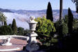 Fog draped hills & terraces seen from Hearst Castle. CA.