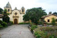 San Carlos Borromeo de Carmelo Mission with gardens & out buildings. Carmel, CA.