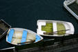 Colored dinghies at anchor at fisherman's wharf. Monterey, CA.