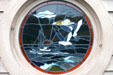 Fishing boat stained glass window on fisherman's wharf. Monterey, CA.