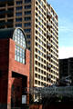 Museum of Contemporary Art with cylindrical roof plus Museum Tower behind. Los Angeles, CA.