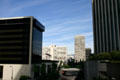 Looking north on Flower Street with white Bunker Hill Tower , Water & Power Building. Los Angeles, CA.