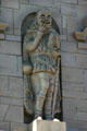 Sculpted actor carrying masks of comedy & tragedy on Million Dollar Theater. Los Angeles, CA.