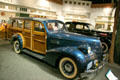 Pontiac station wagon parked at strip mall display at Petersen Automotive Museum. Los Angeles, CA.