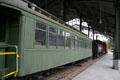 Passenger car under iron platform shelter at Travel Town Museum. Los Angeles, CA.