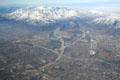 Aerial view along Barstow Freeway & Old Route 66 up mountains. CA.