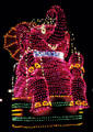 Nighttime lighted float of pink elephant at Disneyland ®. Anaheim, CA.