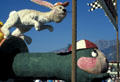 Tortoise & hare race on Rose Parade float. Pasadena, CA.