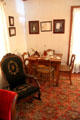 Rocking chair & card table at Davis House Museum. San Diego, CA.