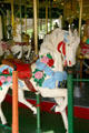 Carved horse with roses on Balboa Park Carousel. San Diego, CA