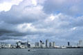 Skyline including North Island & downtown under cumulus clouds. San Diego, CA.