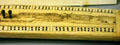 Scrimshaw cribbage board with scene of Alaska at Maritime Museum. San Diego, CA.