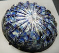 Roman blue glass ribbed bowl with white marbling at Getty Museum Villa. Malibu, CA.