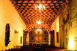 Chapel interior with wooden beams painted in vegetable dyes by Ohlone Indians in Mission Dolores. San Francisco, CA.