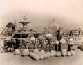 Print shows workers coloring light globes in pastel colors for light show of Panama-Pacific International Exposition in private collection. San Francisco, CA.