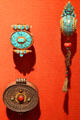 Turquoise & silver boxes & ornaments from Tibet at Asian Art Museum. San Francisco, CA.