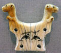 Inuit ivory harpoon rest with carved bears, thunderbirds & whales from Alaska at de Young Museum. San Francisco, CA.