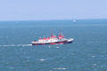 Pilot boats wait off Cliff House to guide in freighters. San Francisco, CA.