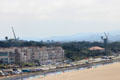 Two windmills mark points where Golden Gate Park meets Pacific Ocean seen from Cliff House. San Francisco, CA.