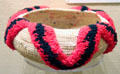 Southern Me-wuk gift basket decorated with yarn and woven with string over grass bundle foundation at Tuolumne County Museum. Sonora, CA.