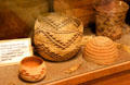 Twinned basketry of Northern California including Karok bowl, Achumawi storage basket & man's cap at El Dorado County Historical Museum. Placerville, CA.