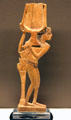 Cosmetic spoon carved as nude in wood at Rosicrucian Egyptian Museum. San Jose, CA.