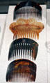 Tortoise shell hair combs from Peru & Mexico City used by Mexican Californians at Oakland Museum of California. Oakland, CA.